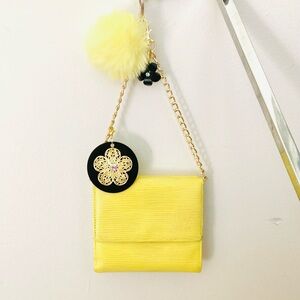 Louis Vuitton Epi Porte Feiulle Elise Wallet
“You are my Sunshine”